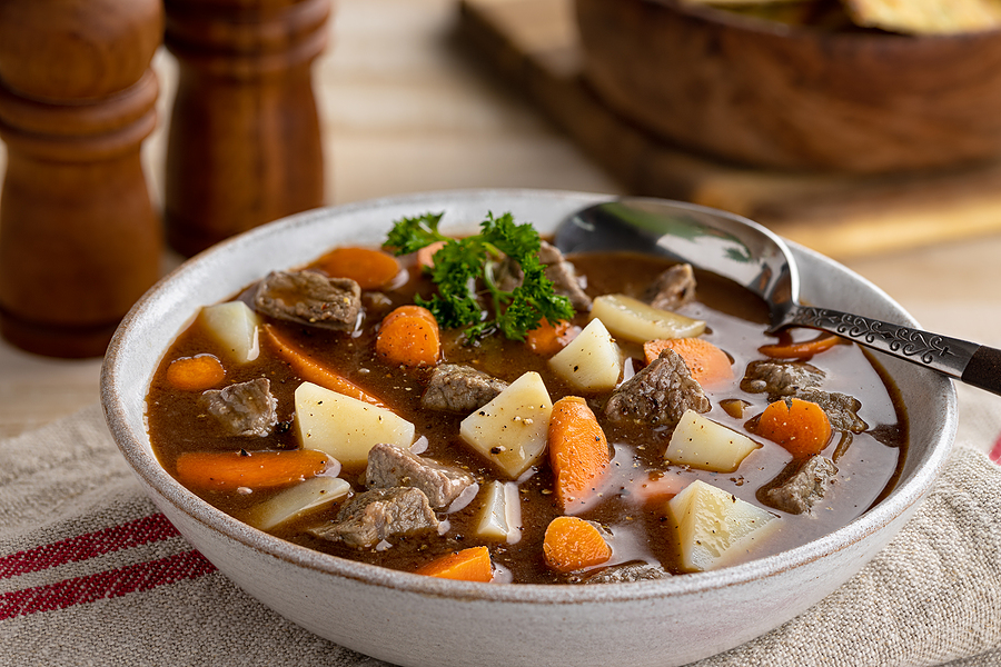 Closeup photo of a bowl of healthy beef stew with vegetables